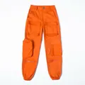 Vorderansicht der orangefarbenen Cargohose mit mehreren praktischen Taschen und Reißverschlüssen. - S / Unterteile / Orange