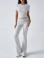 Two-piece grey lounge set featuring a slim-fit crop top and high-waisted flared pants - Gray