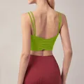 Detail view showing the sexy ruched back and double thin straps of this lime green sports top - S / Tops / Green