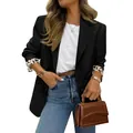 Détail d'un blazer noir pour femme avec une doublure léopard élégante aux poignets - S / Hauts / Noir