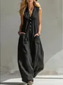Vista intera di una tuta nera smanicata in cotone e lino con bottoni frontali e tasche. - Taglia S / Top E Pantaloni / Nero