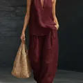 Close-up of elegant burgundy linen sleeveless top and loose wide-leg pants summer set - S / Top And Bottom / Burgundy