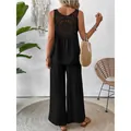 Elegante conjunto negro de dos piezas con un exclusivo recorte de ganchillo detrás. - S / Top Y Pantalón / Negro