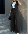 Model wearing a chic black two-piece suit set with a vest and wide-leg trousers - S / Top And Bottom (205) / Black