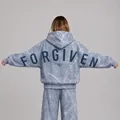 Detailed back view of women's light blue marble print oversized hoodie with Forgiven text - XS / Tops / Blue