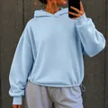 Close-up of light blue oversized hoodie with adjustable drawstring hem for women. - S / Tops / Sky Blue