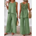 Elegant two-piece green linen set featuring a beautiful circular crochet back detail. - Light Green
