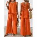 Vibrant orange two-piece summer set with decorative hollow out back and flowy wide leg trousers - Orange