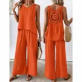 Vibrant orange two-piece summer set with decorative hollow out back and flowy wide leg trousers - Orange