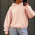 Light pink oversized hooded sweatshirt with drawstring hem and dropped shoulders - S / Tops / Pink
