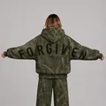 Detailed back view of oversized olive green camo hoodie with black FORGIVEN text - XS / Tops / Green
