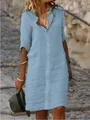 Detail of light blue linen shirt dress with button-down collar and relaxed fit. - S / Top And Bottom / Light Blue