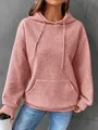 Gros plan du sweat à capuche gaufré rose poudré pour femme avec poche kangourou. - S / Hauts / Rose
