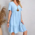 Detailed view of light blue v-neck summer dress with crinkle fabric and tiered hem - S / Tops / Light Blue (8#)