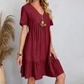 Elegant wine red loose fit V-neck short sleeve dress featuring flowy ruffled hem detail - S / Top And Bottom / Burgundy