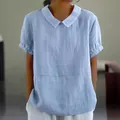 Casual light blue short sleeve cotton blouse with a white Peter Pan collar detail - S / Tops / Light Blue