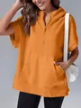 Close-up of a stylish women's orange short sleeve half-zip hoodie with front pocket - S / Tops / Orange