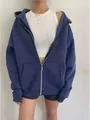 Detail shot of a navy blue women's zip-up hoodie featuring a loose oversized fit - S / Tops / Dark Blue