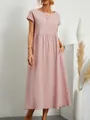 Vista dettagliata di un abito midi rosa in cotone e lino con tasche laterali - Taglia S / Top / Rosa