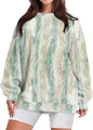 Dettaglio di una felpa oversize con stampa marmo da donna moderna in verde e bianco. - Taglia S / Top / Marmo Verde (6)