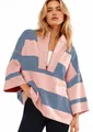 Detailed view of women's pink and blue striped oversized half-zip sweatshirt top - Pink & Grey