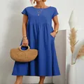 Elegante abito estivo blu senza maniche in cotone e lino con pratiche tasche laterali - blu colorato