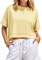 Λεπτομέρεια κίτρινου oversized crop top t-shirt με μπροστινή τσέπη και τελείωμα για το καλοκαίρι. - S / Tops / Κίτρινο