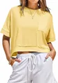 Detail of yellow oversized crop top t-shirt with front pocket and raw hem for summer casual wear. - S / Tops / Yellow