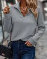 Detail view of grey snake bone texture sweatshirt with quarter-zip stand collar - S / Tops / Gray