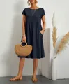 Elegante abito a trapezio in cotone blu scuro a maniche corte con tasche e scollo rotondo - Taglia S / Top / Blu scuro