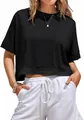Detailed view of women's black oversized crop top featuring a front chest pocket detail - Black