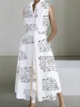Elegant detail view of a white V-neck sleeveless maxi dress with black script print. - XS / Dresses / White with Black Letter Print