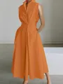 Detailed view of an elegant orange V-neck sleeveless midi dress with button accent - XS / Dresses / Orange