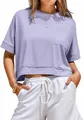 Detail showing the oversized fit and front pocket of the lavender cropped T-shirt. - S / Tops / Light Purple