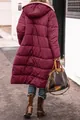 Back view detail showing the quilted texture of a long maroon hooded puffer coat for winter - S / Tops / Burgundy
