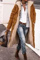 Outdoor street style showing a long brown hooded coat with warm sherpa lining detail - S / Tops / Dark Brown