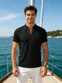 Close-up detail of men's black lace-up V-neck T-shirt with textured waffle knit fabric - S / Tops / Black