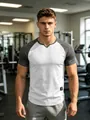 Athletic men's raglan sleeve sports T-shirt with white ribbed body and grey sleeves - S / Tops / White Light Gray Contrast