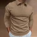 Detail of men's long-sleeve polo shirt featuring a khaki vertical stripe texture and V-neck - Khaki