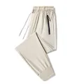 Comfortable men's beige ice silk joggers featuring quick-dry fabric and drawstring waist - M / Bottom (Jogger) / Khaki
