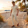 Men's two-piece summer leisure set featuring a lace-up shirt and textured trousers on a beach - Off White