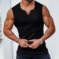Close-up of men's black ribbed tank top showing athletic fit and V-notch neck - M / Tops / Black