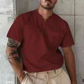 Detail view of men's maroon V-neck T-shirt with chest pocket design. - Burgundy