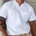 Close-up of white men's V-neck t-shirt featuring a chest pocket and soft cotton fabric - S / Tops / White