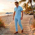 Full view of light blue men's lace-up summer short sleeve and pants set on a beach - S / Top And Bottom / Sky Blue
