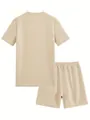 Back view of men's waffle texture short sleeve t-shirt and shorts set in beige - S / Top And Bottom / Apricot
