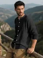 Premium men's black cotton linen long-sleeved shirt detail shown on model outdoors - Black
