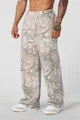 Close-up detail of YOUNGLA camo print loose-fit gym sweatpants for athletic wear - S / Bottoms / Apricot Camouflage
