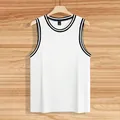 Macro detail view of white ribbed knit fabric and black contrast trimmed neckline - S / Tops / White