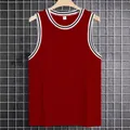 Detailed macro view of a red ribbed knit fitness tank top for men with striped trim edges - Red